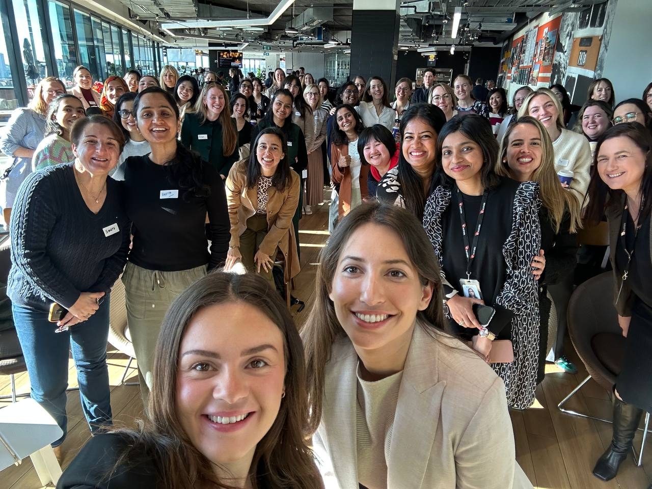 Data Mornings members smiling for a group selfie